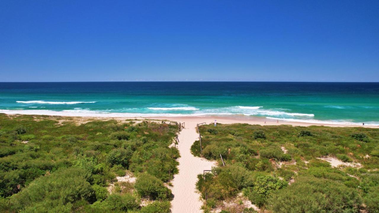 Pullman Magenta Shores Resort Entrance Exterior photo View of the beach from the lighthouse